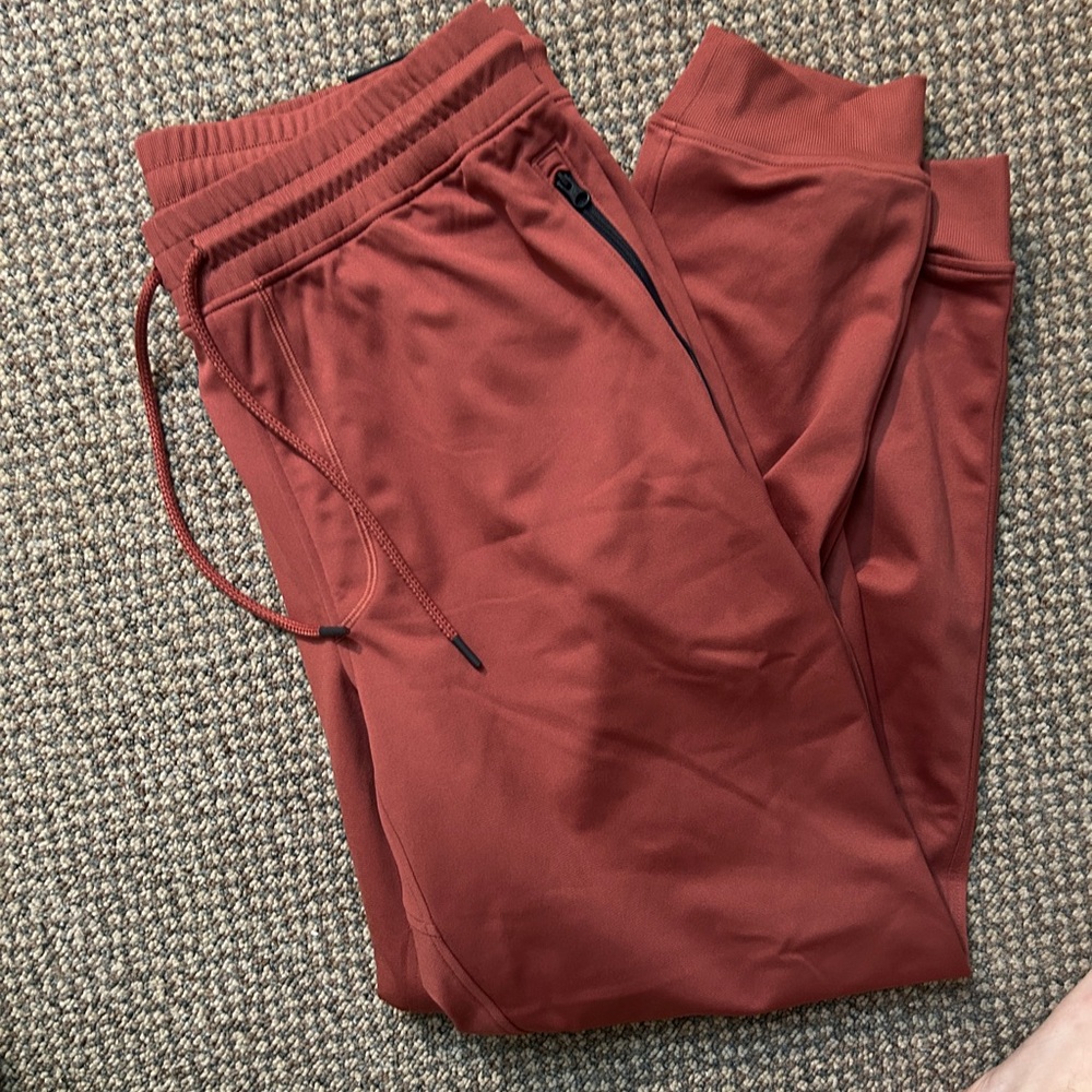 Under Armour Orange and Red Sweatpants for Casual Comfort